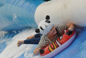 Ilminster Town FC fun day Part 14 – July 9, 2016: A giant water slide was the star attraction at a family fun day held to celebrate Ilminster Town Football Club’s new Archie Gooch Pavilion headquarters in Britten’s Field. Photo 15