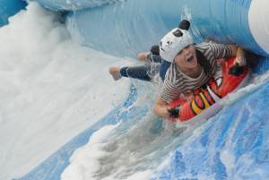 Ilminster Town FC fun day Part 14 – July 9, 2016: A giant water slide was the star attraction at a family fun day held to celebrate Ilminster Town Football Club’s new Archie Gooch Pavilion headquarters in Britten’s Field. Photo 16