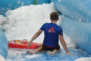 Ilminster Town FC fun day Part 14 – July 9, 2016: A giant water slide was the star attraction at a family fun day held to celebrate Ilminster Town Football Club’s new Archie Gooch Pavilion headquarters in Britten’s Field. Photo 23