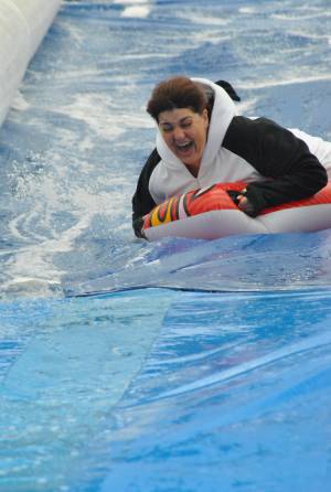 Ilminster Town FC fun day Part 14 – July 9, 2016: A giant water slide was the star attraction at a family fun day held to celebrate Ilminster Town Football Club’s new Archie Gooch Pavilion headquarters in Britten’s Field. Photo 25