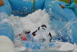Ilminster Town FC fun day Part 14 – July 9, 2016: A giant water slide was the star attraction at a family fun day held to celebrate Ilminster Town Football Club’s new Archie Gooch Pavilion headquarters in Britten’s Field. Photo 28