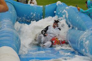 Ilminster Town FC fun day Part 14 – July 9, 2016: A giant water slide was the star attraction at a family fun day held to celebrate Ilminster Town Football Club’s new Archie Gooch Pavilion headquarters in Britten’s Field. Photo 29