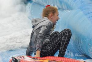 Ilminster Town FC fun day Part 14 – July 9, 2016: A giant water slide was the star attraction at a family fun day held to celebrate Ilminster Town Football Club’s new Archie Gooch Pavilion headquarters in Britten’s Field. Photo 5
