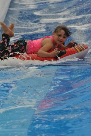 Ilminster Town FC fun day Part 14 – July 9, 2016: A giant water slide was the star attraction at a family fun day held to celebrate Ilminster Town Football Club’s new Archie Gooch Pavilion headquarters in Britten’s Field. Photo 6