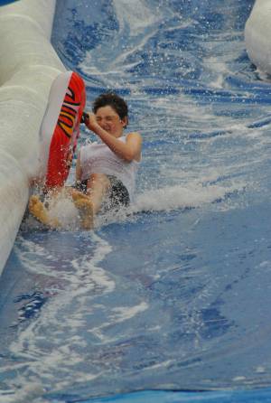 Ilminster Town FC fun day Part 14 – July 9, 2016: A giant water slide was the star attraction at a family fun day held to celebrate Ilminster Town Football Club’s new Archie Gooch Pavilion headquarters in Britten’s Field. Photo 9