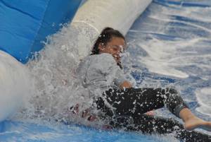 Ilminster Town FC fun day Part 15 – July 9, 2016: A giant water slide was the star attraction at a family fun day held to celebrate Ilminster Town Football Club’s new Archie Gooch Pavilion headquarters in Britten’s Field. Photo 15