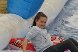 Ilminster Town FC fun day Part 15 – July 9, 2016: A giant water slide was the star attraction at a family fun day held to celebrate Ilminster Town Football Club’s new Archie Gooch Pavilion headquarters in Britten’s Field. Photo 16