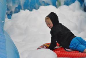 Ilminster Town FC fun day Part 15 – July 9, 2016: A giant water slide was the star attraction at a family fun day held to celebrate Ilminster Town Football Club’s new Archie Gooch Pavilion headquarters in Britten’s Field. Photo 20