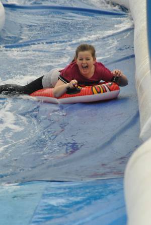 Ilminster Town FC fun day Part 15 – July 9, 2016: A giant water slide was the star attraction at a family fun day held to celebrate Ilminster Town Football Club’s new Archie Gooch Pavilion headquarters in Britten’s Field. Photo 21