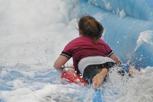 Ilminster Town FC fun day Part 15 – July 9, 2016: A giant water slide was the star attraction at a family fun day held to celebrate Ilminster Town Football Club’s new Archie Gooch Pavilion headquarters in Britten’s Field. Photo 23