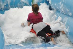 Ilminster Town FC fun day Part 15 – July 9, 2016: A giant water slide was the star attraction at a family fun day held to celebrate Ilminster Town Football Club’s new Archie Gooch Pavilion headquarters in Britten’s Field. Photo 24