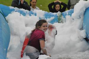 Ilminster Town FC fun day Part 15 – July 9, 2016: A giant water slide was the star attraction at a family fun day held to celebrate Ilminster Town Football Club’s new Archie Gooch Pavilion headquarters in Britten’s Field. Photo 26