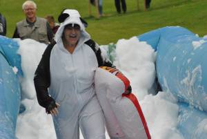 Ilminster Town FC fun day Part 15 – July 9, 2016: A giant water slide was the star attraction at a family fun day held to celebrate Ilminster Town Football Club’s new Archie Gooch Pavilion headquarters in Britten’s Field. Photo 2