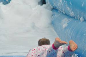 Ilminster Town FC fun day Part 15 – July 9, 2016: A giant water slide was the star attraction at a family fun day held to celebrate Ilminster Town Football Club’s new Archie Gooch Pavilion headquarters in Britten’s Field. Photo 6