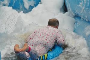 Ilminster Town FC fun day Part 15 – July 9, 2016: A giant water slide was the star attraction at a family fun day held to celebrate Ilminster Town Football Club’s new Archie Gooch Pavilion headquarters in Britten’s Field. Photo 7