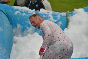 Ilminster Town FC fun day Part 15 – July 9, 2016: A giant water slide was the star attraction at a family fun day held to celebrate Ilminster Town Football Club’s new Archie Gooch Pavilion headquarters in Britten’s Field. Photo 8