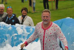 Ilminster Town FC fun day Part 15 – July 9, 2016: A giant water slide was the star attraction at a family fun day held to celebrate Ilminster Town Football Club’s new Archie Gooch Pavilion headquarters in Britten’s Field. Photo 9