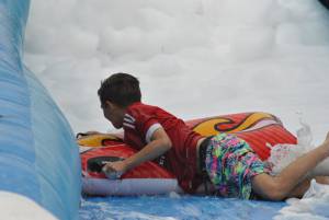 Ilminster Town FC fun day Part 16 – July 9, 2016: A giant water slide was the star attraction at a family fun day held to celebrate Ilminster Town Football Club’s new Archie Gooch Pavilion headquarters in Britten’s Field. Photo 11