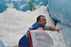 Ilminster Town FC fun day Part 16 – July 9, 2016: A giant water slide was the star attraction at a family fun day held to celebrate Ilminster Town Football Club’s new Archie Gooch Pavilion headquarters in Britten’s Field. Photo 6