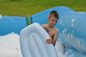 Ilminster Town FC fun day Part 17 – July 9, 2016: A giant water slide was the star attraction at a family fun day held to celebrate Ilminster Town Football Club’s new Archie Gooch Pavilion headquarters in Britten’s Field. Photo 10