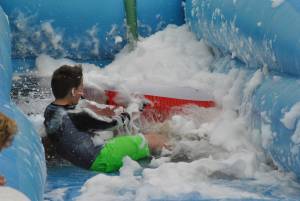 Ilminster Town FC fun day Part 17 – July 9, 2016: A giant water slide was the star attraction at a family fun day held to celebrate Ilminster Town Football Club’s new Archie Gooch Pavilion headquarters in Britten’s Field. Photo 14