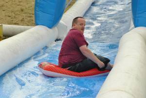 Ilminster Town FC fun day Part 17 – July 9, 2016: A giant water slide was the star attraction at a family fun day held to celebrate Ilminster Town Football Club’s new Archie Gooch Pavilion headquarters in Britten’s Field. Photo 17