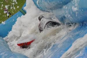 Ilminster Town FC fun day Part 17 – July 9, 2016: A giant water slide was the star attraction at a family fun day held to celebrate Ilminster Town Football Club’s new Archie Gooch Pavilion headquarters in Britten’s Field. Photo 20