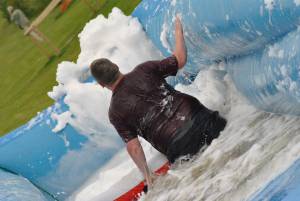 Ilminster Town FC fun day Part 17 – July 9, 2016: A giant water slide was the star attraction at a family fun day held to celebrate Ilminster Town Football Club’s new Archie Gooch Pavilion headquarters in Britten’s Field. Photo 21