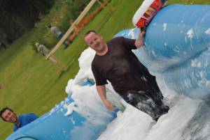 Ilminster Town FC fun day Part 17 – July 9, 2016: A giant water slide was the star attraction at a family fun day held to celebrate Ilminster Town Football Club’s new Archie Gooch Pavilion headquarters in Britten’s Field. Photo 22