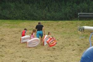 Ilminster Town FC fun day Part 17 – July 9, 2016: A giant water slide was the star attraction at a family fun day held to celebrate Ilminster Town Football Club’s new Archie Gooch Pavilion headquarters in Britten’s Field. Photo 26
