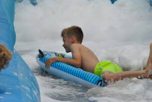 Ilminster Town FC fun day Part 17 – July 9, 2016: A giant water slide was the star attraction at a family fun day held to celebrate Ilminster Town Football Club’s new Archie Gooch Pavilion headquarters in Britten’s Field. Photo 9