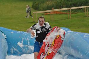 Ilminster Town FC fun day Part 18 – July 9, 2016: A giant water slide was the star attraction at a family fun day held to celebrate Ilminster Town Football Club’s new Archie Gooch Pavilion headquarters in Britten’s Field. Photo 10