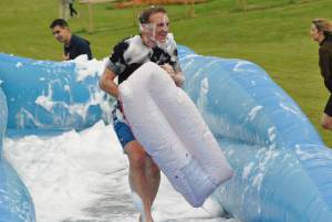 Ilminster Town FC fun day Part 18 – July 9, 2016: A giant water slide was the star attraction at a family fun day held to celebrate Ilminster Town Football Club’s new Archie Gooch Pavilion headquarters in Britten’s Field. Photo 12