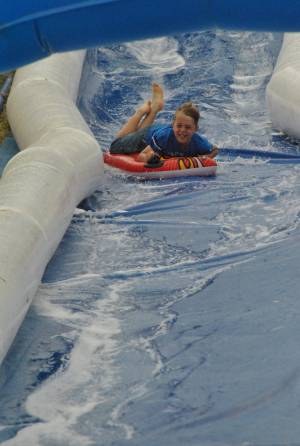 Ilminster Town FC fun day Part 18 – July 9, 2016: A giant water slide was the star attraction at a family fun day held to celebrate Ilminster Town Football Club’s new Archie Gooch Pavilion headquarters in Britten’s Field. Photo 19