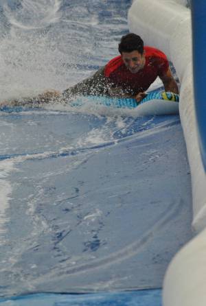 Ilminster Town FC fun day Part 18 – July 9, 2016: A giant water slide was the star attraction at a family fun day held to celebrate Ilminster Town Football Club’s new Archie Gooch Pavilion headquarters in Britten’s Field. Photo 27
