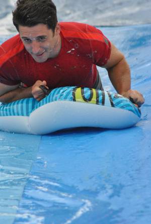 Ilminster Town FC fun day Part 18 – July 9, 2016: A giant water slide was the star attraction at a family fun day held to celebrate Ilminster Town Football Club’s new Archie Gooch Pavilion headquarters in Britten’s Field. Photo 30
