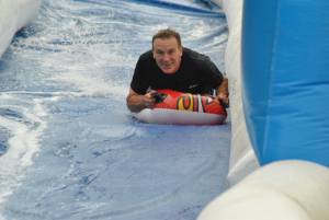 Ilminster Town FC fun day Part 18 – July 9, 2016: A giant water slide was the star attraction at a family fun day held to celebrate Ilminster Town Football Club’s new Archie Gooch Pavilion headquarters in Britten’s Field. Photo 3