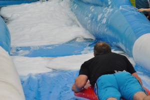 Ilminster Town FC fun day Part 18 – July 9, 2016: A giant water slide was the star attraction at a family fun day held to celebrate Ilminster Town Football Club’s new Archie Gooch Pavilion headquarters in Britten’s Field. Photo 6