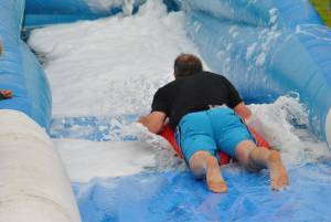 Ilminster Town FC fun day Part 18 – July 9, 2016: A giant water slide was the star attraction at a family fun day held to celebrate Ilminster Town Football Club’s new Archie Gooch Pavilion headquarters in Britten’s Field. Photo 7