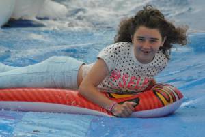 Ilminster Town FC fun day Part 19 – July 9, 2016: A giant water slide was the star attraction at a family fun day held to celebrate Ilminster Town Football Club’s new Archie Gooch Pavilion headquarters in Britten’s Field. Photo 10