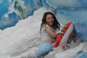 Ilminster Town FC fun day Part 19 – July 9, 2016: A giant water slide was the star attraction at a family fun day held to celebrate Ilminster Town Football Club’s new Archie Gooch Pavilion headquarters in Britten’s Field. Photo 11