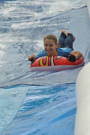 Ilminster Town FC fun day Part 19 – July 9, 2016: A giant water slide was the star attraction at a family fun day held to celebrate Ilminster Town Football Club’s new Archie Gooch Pavilion headquarters in Britten’s Field. Photo 13