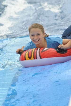 Ilminster Town FC fun day Part 19 – July 9, 2016: A giant water slide was the star attraction at a family fun day held to celebrate Ilminster Town Football Club’s new Archie Gooch Pavilion headquarters in Britten’s Field. Photo 14