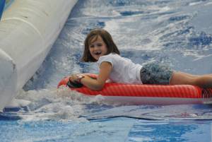 Ilminster Town FC fun day Part 19 – July 9, 2016: A giant water slide was the star attraction at a family fun day held to celebrate Ilminster Town Football Club’s new Archie Gooch Pavilion headquarters in Britten’s Field. Photo 20