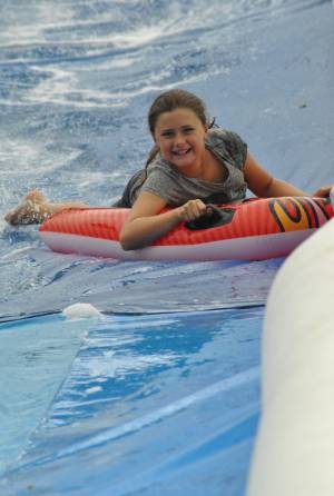 Ilminster Town FC fun day Part 19 – July 9, 2016: A giant water slide was the star attraction at a family fun day held to celebrate Ilminster Town Football Club’s new Archie Gooch Pavilion headquarters in Britten’s Field. Photo 23
