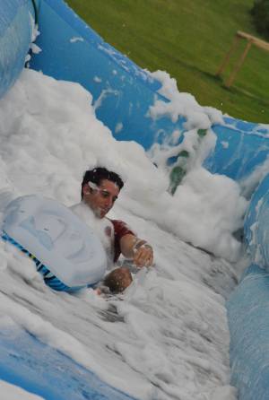 Ilminster Town FC fun day Part 19 – July 9, 2016: A giant water slide was the star attraction at a family fun day held to celebrate Ilminster Town Football Club’s new Archie Gooch Pavilion headquarters in Britten’s Field. Photo 4