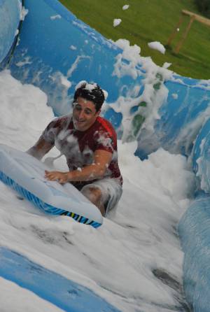Ilminster Town FC fun day Part 19 – July 9, 2016: A giant water slide was the star attraction at a family fun day held to celebrate Ilminster Town Football Club’s new Archie Gooch Pavilion headquarters in Britten’s Field. Photo 5