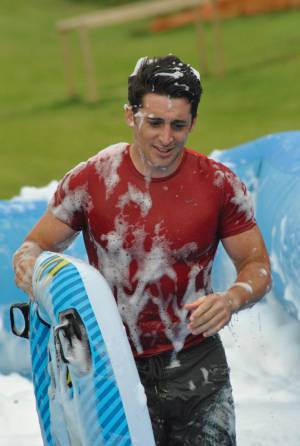Ilminster Town FC fun day Part 19 – July 9, 2016: A giant water slide was the star attraction at a family fun day held to celebrate Ilminster Town Football Club’s new Archie Gooch Pavilion headquarters in Britten’s Field. Photo 7