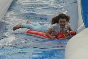 Ilminster Town FC fun day Part 19 – July 9, 2016: A giant water slide was the star attraction at a family fun day held to celebrate Ilminster Town Football Club’s new Archie Gooch Pavilion headquarters in Britten’s Field. Photo 9