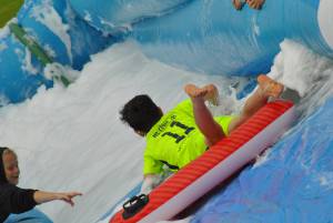 Ilminster Town FC fun day Part 20 – July 9, 2016: A giant water slide was the star attraction at a family fun day held to celebrate Ilminster Town Football Club’s new Archie Gooch Pavilion headquarters in Britten’s Field. Photo 12